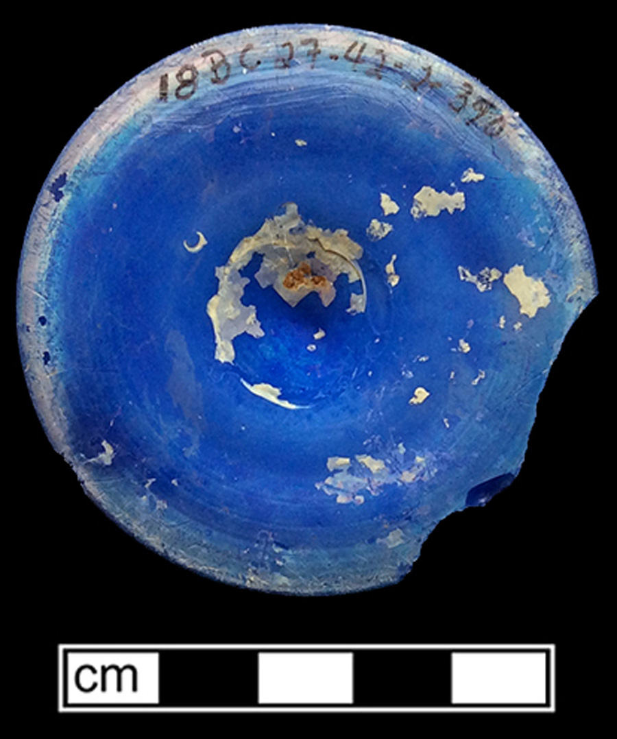 Image of transparent colored glass hollow vessel.