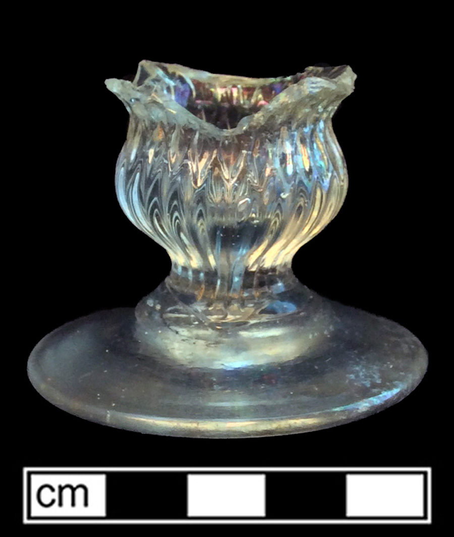 Image of colorless glass salt or dessert glass, hot glass decoration.