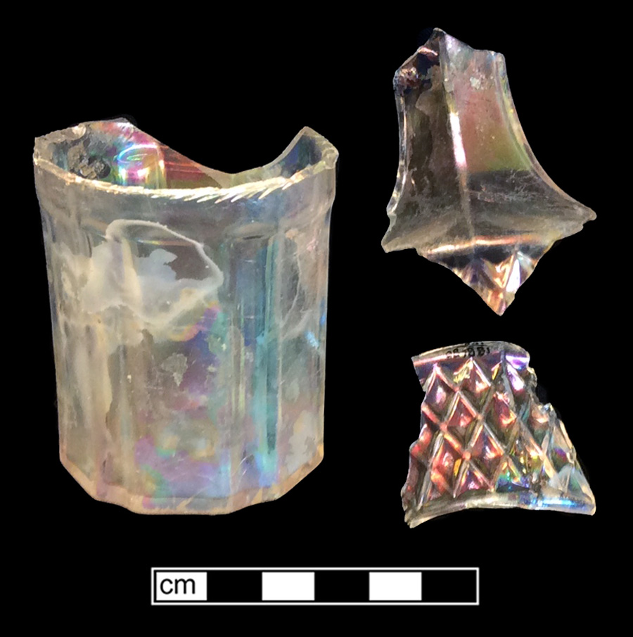Image of colorless glass castor or cruet, hot glass decoration.