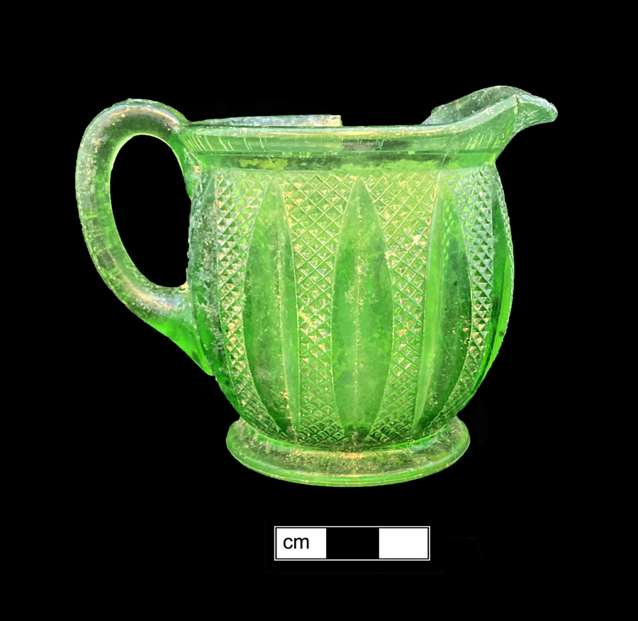 Image of colored glass creamer, uranium glass, hot glass decoration.