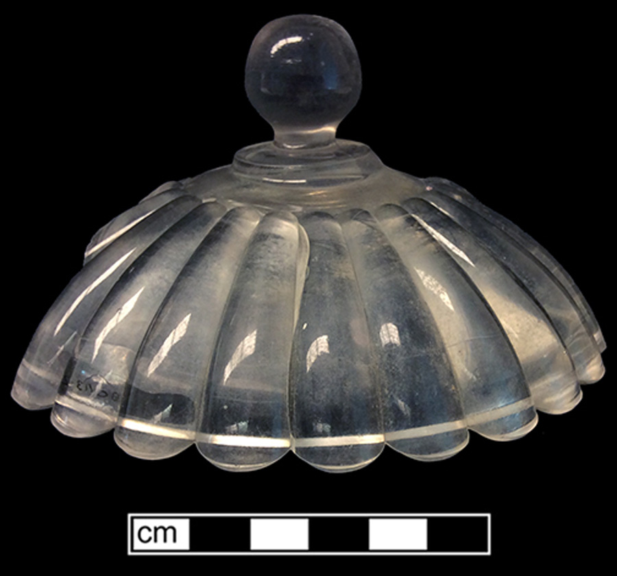 Image of colorless glass compote lid, hot glass decoration.