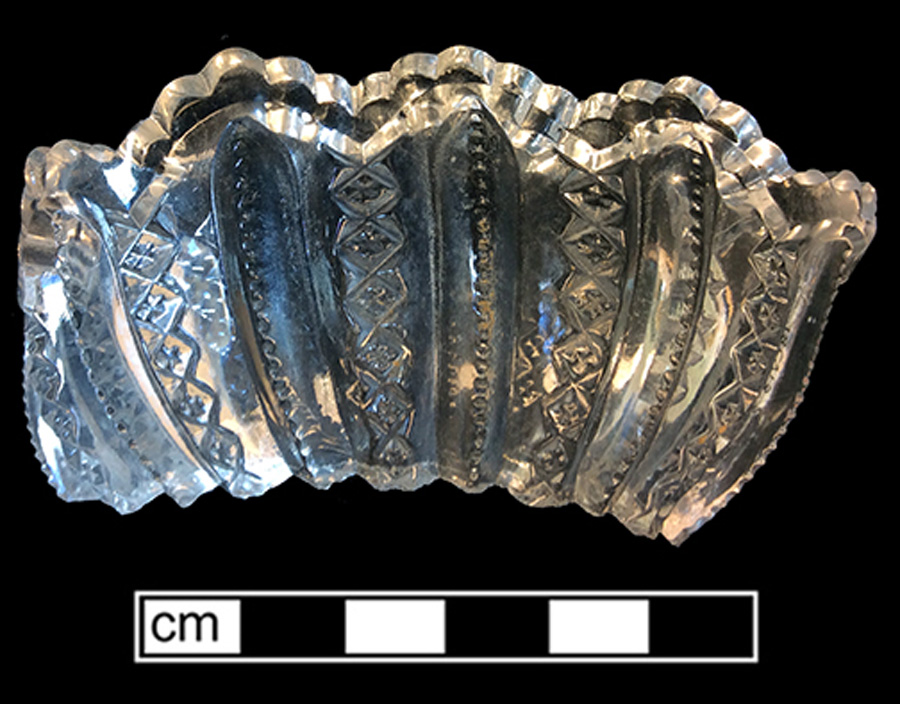 Image of colorless glass bowl/nappy, hot glass decoration.