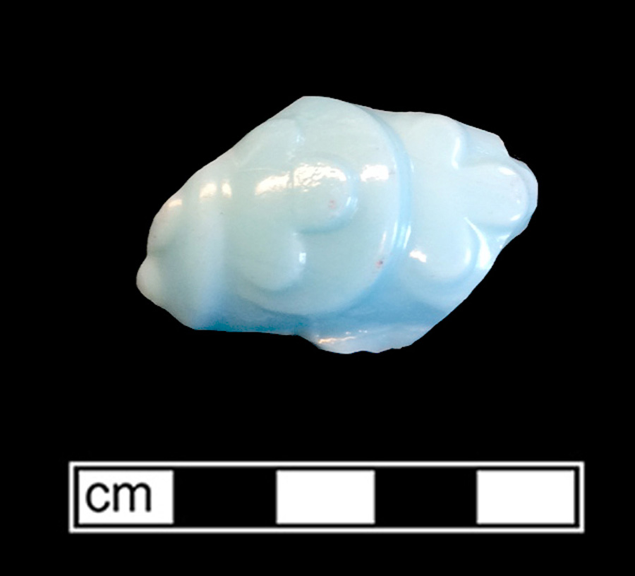 Image of opaque colored glass hollow vessel, hot glass decoration.