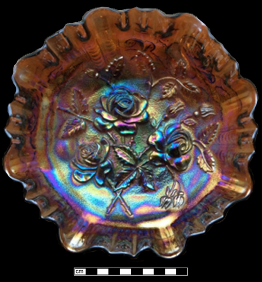 Image of transparent colored glass dish, iridescent glass, hot glass decoration.