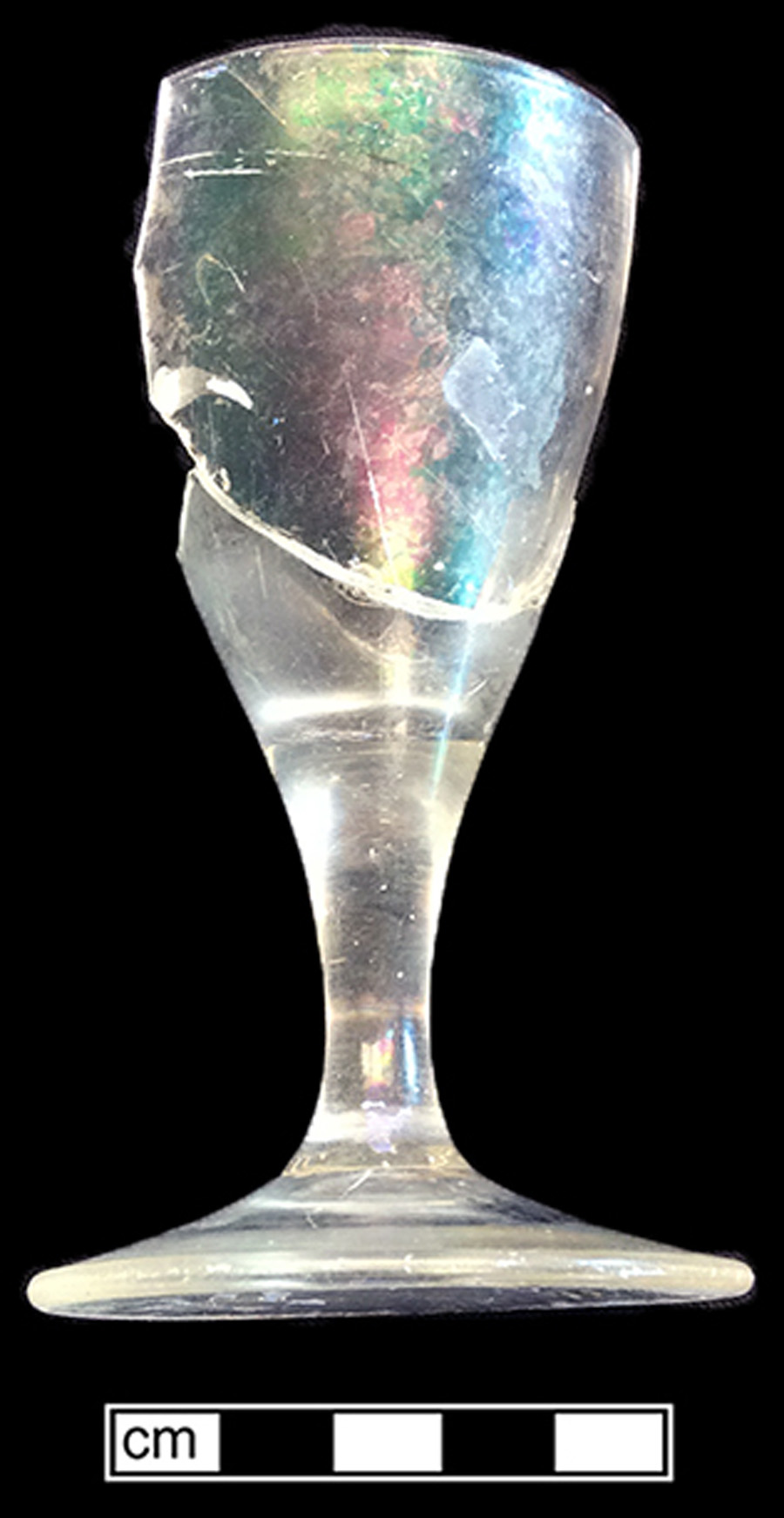Image of colorless glass stemmed glass, cordial glass.