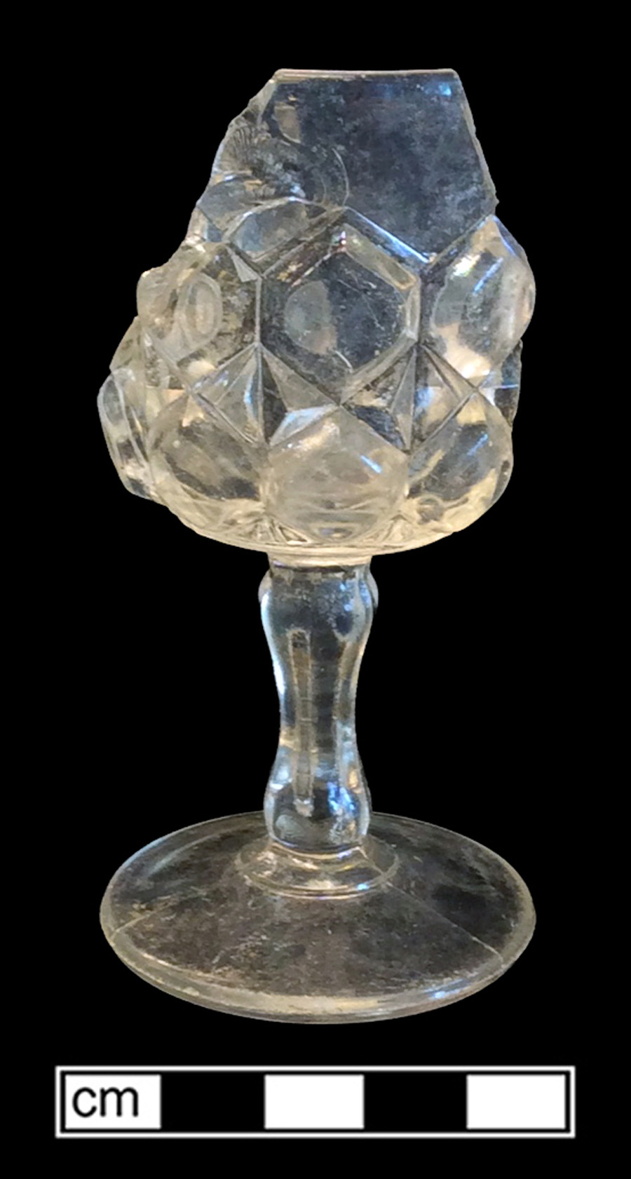 Image of colorless glass stemmed glass, hot glass decoration.