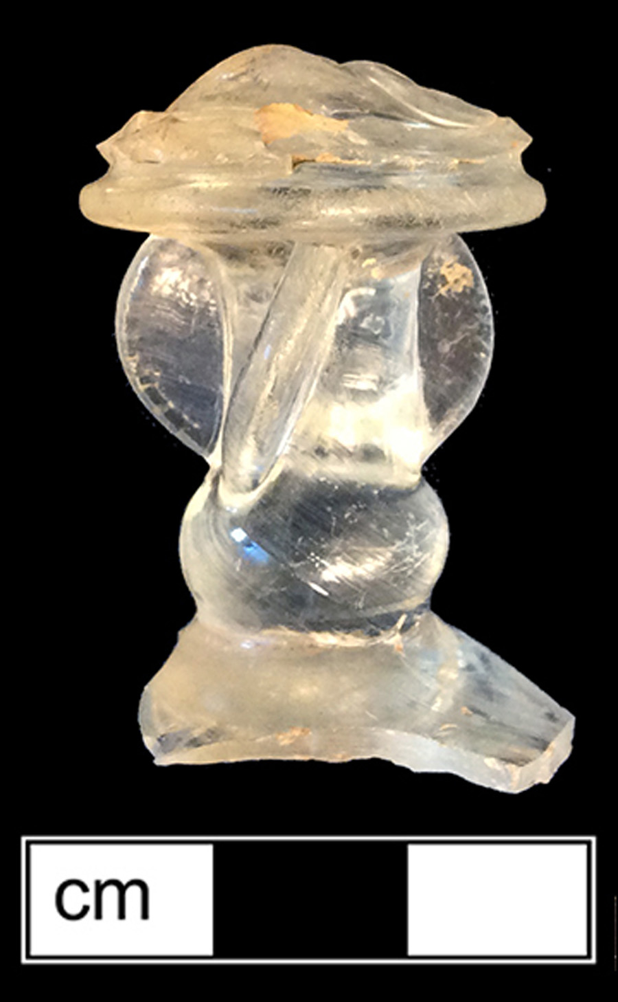 Image of colorless glass stemmed glass, hot glass decoration.