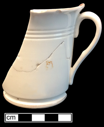 Continental European hard paste porcelain mug with gold luster over pink painted letters. &ldquo;Zum&hellip;Frohen F&hellip;&rdquo; (To a happy F) [Fest?]. Rim diameter: 3.50&rdquo;, Base diameter: 2.75&rdquo;, Vessel height: 3.50&rdquo;. Lot #: 33-1, 2, 3. 18BC56