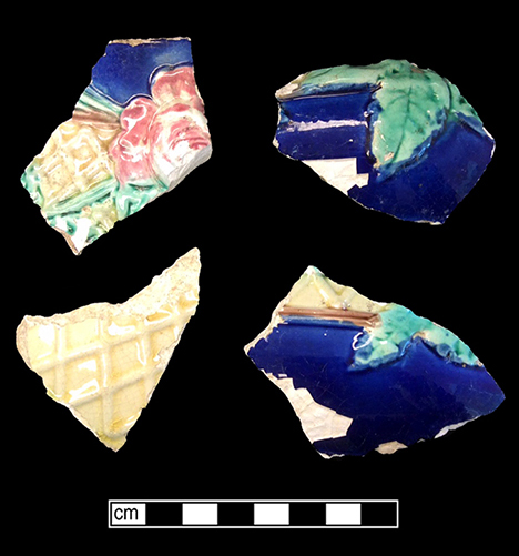 Hollow vessel in an unidentified form.  Molded and painted floral motif.  This vessel displays a pink interior glaze. Lot #: 33-45. 18BC56.