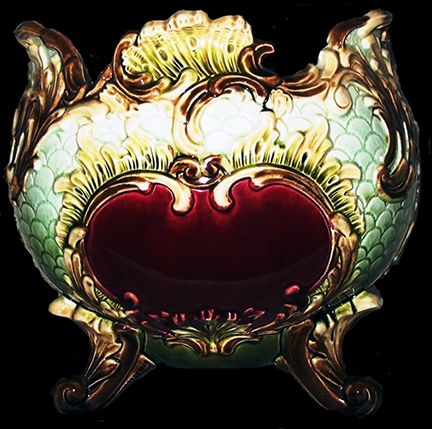 Majolica jardinierre or planter with scales and medallion design, from a private collection.