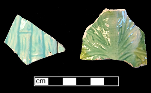 Left: Molded hollow vessel with bamboo motif. The interior of this vessel has a pink lead glaze. Right: Molded hollow vessel (jug?) with a leaf motif. The interior of this vessel has a yellow lead glaze.