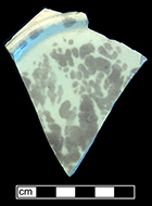 Molded plate with fern motif. The underside of this vessel has a mottled brown and green lead glaze. From Mayer Pottery Company – Arsenal Pottery (c. 1876-1908).  