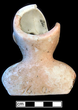 Molded and painted bisque porcelain doll head and shoulders. 18BC80