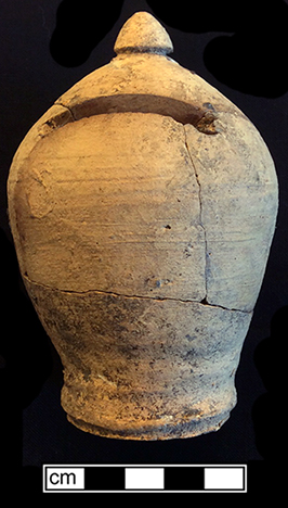 Unglazed red earthenware money box. This style and shape of money box was made for at least four centuries and could be glazed or left unglazed.  A similar money box in the collections of the Museum of London has been dated broadly between c. 1580 and 1900. It is possible that this bank was made by a Baltimore potter. 18BC80