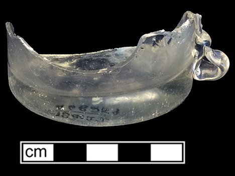Colorless soda lime glass handled mug. Empontilled. 2.75” base diameter. Lot 254. 18BC27-F26