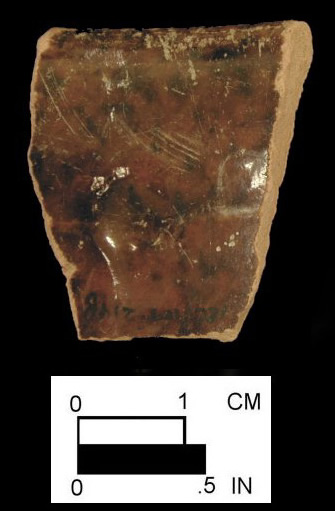 Red border ware mug as identified by Jacqueline Pearce 1999, with glazed interior and exterior with pinkish red paste, 3" diameter, interior on left and exterior right, from Melon Field Site 18CV169 /214. 