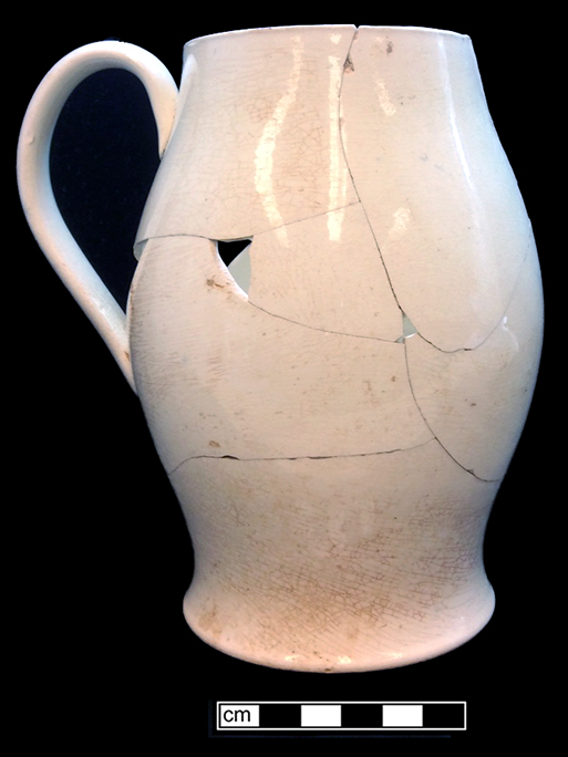 Creamware jug/pitcher, undecorated. Rim diameter: 3.50&rdquo;, Base diameter: 3.75&rdquo;, Vessel height: 7.00&rdquo;. Lot: 47F 345-45. 18BC50.