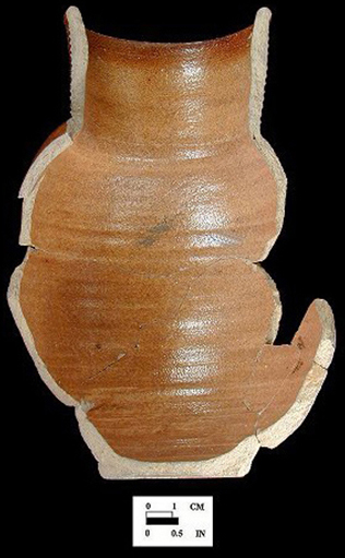 English brown salt glaze stoneware jug with iron oxide slip.  Cordoned neck and strap handle from Oxon Hill site 18PR175, vessel #2336-exterior view on left and interior on right.