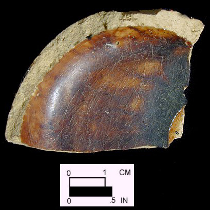 Manganese Mottled mug with view of interior base from Angelica Knolls site 18CV60. This vessel has cordoning on the exterior foot band.