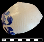 Gray-bodied salt glaze stoneware unidentified hollow vessel with engraved (incised) foliage motifs and cobalt-blue painted decoration under the glaze. The chatter marks visible along the body of this vessel date its manufacture to the 18th century.