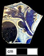 Gray-bodied salt glaze stoneware unidentified hollow vessel with engraved (incised) foliage motifs and cobalt-blue painted decoration under the glaze, from 18CV60. 