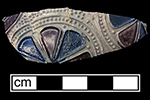 Gray-bodied salt glaze stoneware hollow (mug or jug)  with applied (sprigged) motifs with cobalt blue and manganese purple decoration painted under the glaze, from 18CV60.   