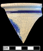 Gray-bodied salt glazed stoneware chamberpot  with applied rampant lion outlined in cobalt-blue  under the glaze.  Cordoned rim. 7.5&rdquo; rim diameter. The chatter marks visible along the body of this vessel are indicative of 18th-century production. Lot number 18ST704-633.