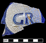 Gray-bodied salt glazed stoneware jug with applied round medallion molded with crowned GR cipher of King George I (1714-1727) or King George II (1727-1760), from 18CV60.   