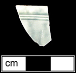 Clouded creamware cup, 3&rdquo; rim diameter.  Vessel has colorless lead glaze on the interior - collected by George L. Miller in 1986 in Staffordshire, England.