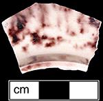 Saucer base footring. This vessel has a tortoiseshell pattern on both the interior and exterior. Collected by George L. Miller in 1986 in Staffordshire, England.