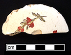 Creamware teapot lid, painted overglaze. Rim diameter: 2.75”, Lot: 35C 229-1.