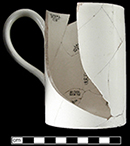 Undecorated creamware mug that has been mended from 18ST642-NAVAIR.