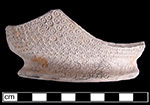 Unglazed, biscuit fired waster.  Hollow form base (jug, coffeepot or teapot), 3.25&rdquo; base diameter.  Molded with a ground of punchwork circlets; also called &ldquo;ring and dot&rdquo; or &ldquo;partridge eye&rdquo; (South 2004:24) - collected by George L. Miller in 1986 in Staffordshire, England.