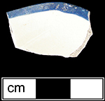 Overglaze painted blue band on rim, unidentifed vessel from HanleySite-Staffordshire, England.