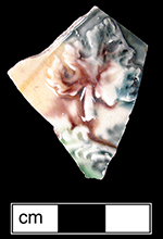 Clouded ware, sprig molded.