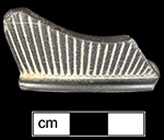Black Basalt hollow vessel,&nbsp;possible teapot, with reeded motif - Found on the banks of the Thames River in London, 2003.&nbsp;In MAC Lab collections.