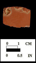 Dry-bodied red stoneware (rosso antico) hollow vessel,sprig molded decoration (front and back) from Oxon Hilkl, 18PR175. 