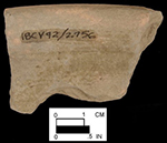 North Devon gravel-free coarse earthenware hollow vessel. Lead glazed interior (left); unglazed exterior (right), vessel diameter approximately 9&rdquo; rim diameter. Square 2756.