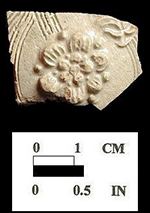 Hӧhr Rhenish Stoneware jug or mug with applied (sprigged) floral motif and engraved stem. Hӧhr Rhenish Stoneware typically produced c. 1675 to 1750, from 18CV60.