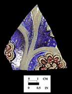 Gray-bodied salt glaze stoneware Jug with applied (sprigged) floral motifs with engraved (incised) stems and cobalt-blue and manganese purple decoration painted under the glaze.  Possibly similar to complete vessel shown here.  Vessel probably dates to second half of 17th century, based on the applied and incised motifs with cobalt blue and manganese, from 18CV60. Complete similar example from Private collection shown on right.