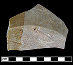 North Devon Sgraffito indeterminate vessel, probable dish. White slip over red earthenware body, with lead glazed interior.  Incised motif.