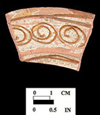 White slip over red earthenware body, with lead glazed interior.  Incised repeating spiral (curlicue) motif.  7” rim diameter. Most of the lead glaze and some of the white slip have worn away from this sherd.