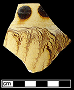 North Midlands combed and dotted slipware cup.  Dotted decoration common in 17th and 18th century.  Glazed interior and exterior.  Rim diameter  approximately 5&rdquo; - Collected by George L. Miller in 1986 in Staffordshire, England.
