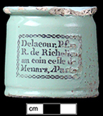 Nineteenth-century French  ointment pot with stenciled label, with white tin glazed interior.