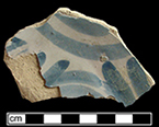 Charger painted in blue geometric motif.