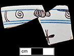 Bowl decorated in blue and purple with Chinoiserie scroll motif - see whole plate on right with similar pattern. Similar rim motifs depicted in Britton (1982: various) and Black (2001:25) date from c. 1740 to 1770.