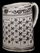 Whole example of a chinese common shaped cup with painted star and grid pattern from a private collection.