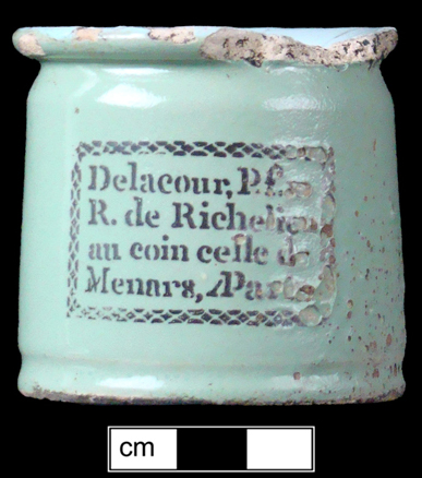 Nineteenth-century French  ointment pot with stenciled label, with white tin glazed interior.