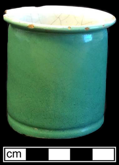 Nineteenth-century French ointment pot with white tin glazed interior and green tin glazed exterior.  Stencilled initials D. R. on base. Rim diameter: 2.5&rdquo;; Base diameter: 2.25&rdquo;; Vessel height: 2.5&rdquo; - from 18BC33.