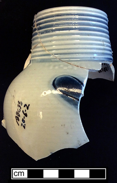 Debased scratch blue white salt glaze stoneware jug.  Manufactured c. 1770-1800. Estimated height: 4.5 to 5.0&rdquo;; Rim diameter: 1.75&rdquo;; Base diameter 2.0&rdquo; - from 18BC33.